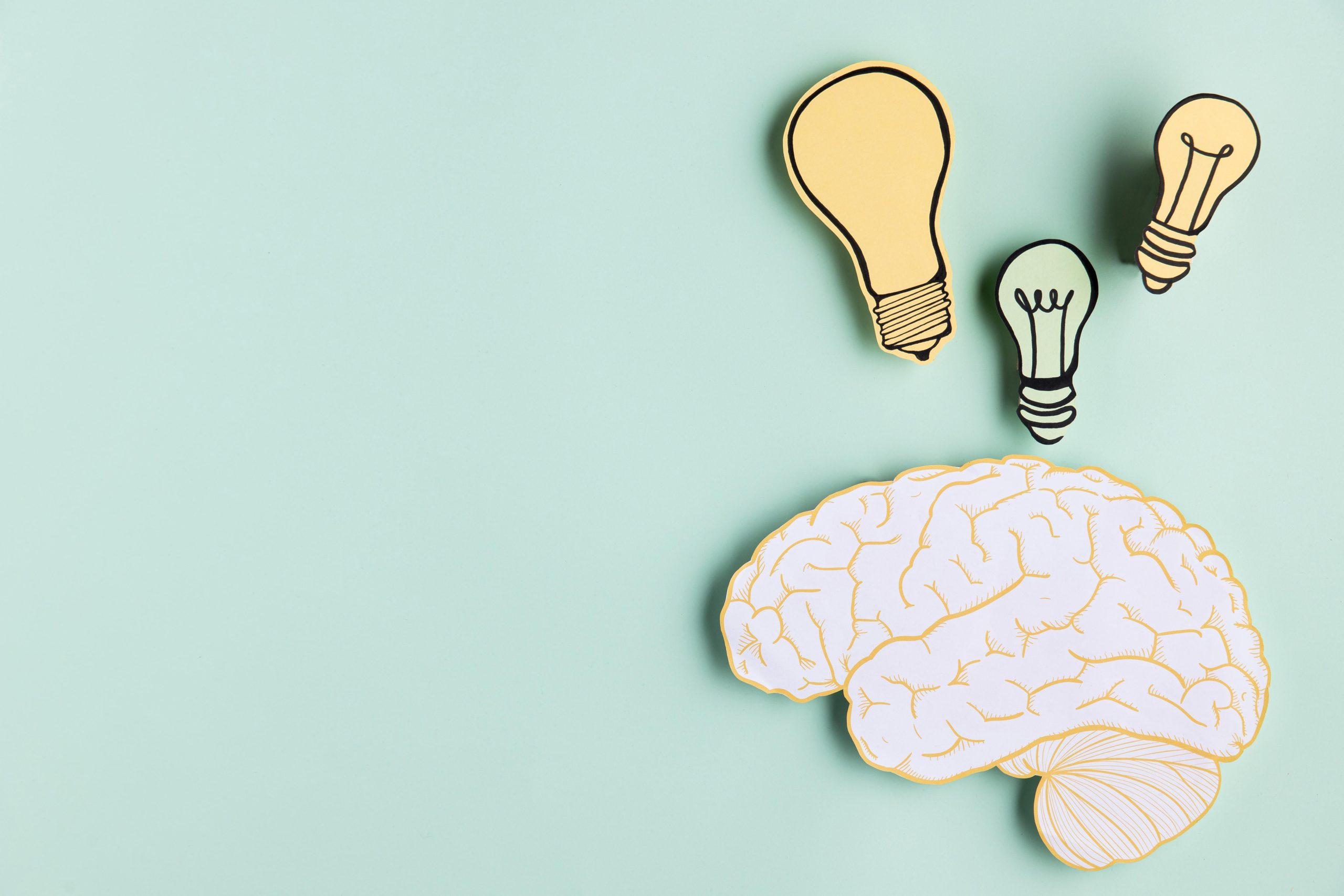 copy-space-paper-brain-with-light-bulb-scaled